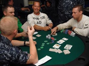 imgi_461_US_Navy_090620-N-2798F-033_Sailors_assigned_to_the_aircraft_carrier_USS_Harry_S._Truman_(CVN_75)_and_Carrier_Air_Wing_(CVW)_3_compete_in_a_Texas_Hold_'Em_Poker_tournament_abo
